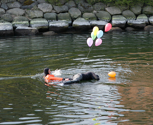 Under the Rainbow, diver with the figure